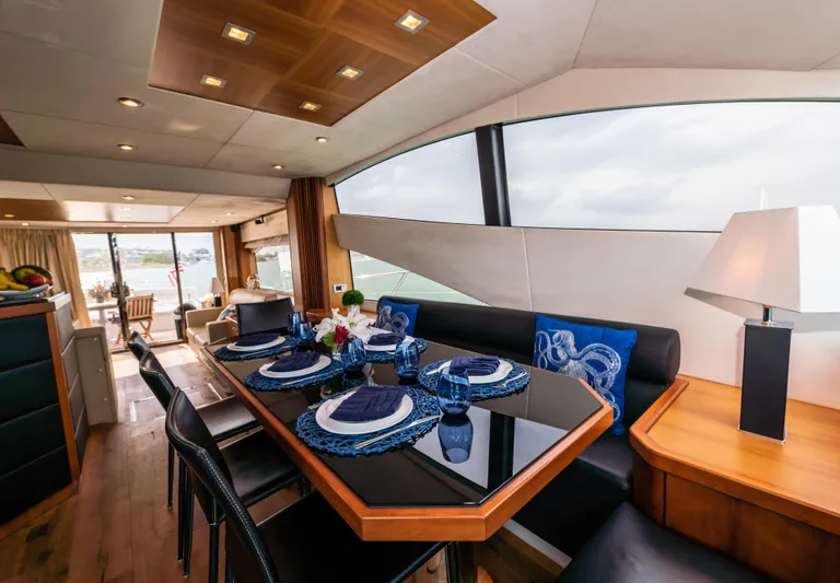 My Sirena Yacht Photos Pics Luxurious interior of 2008 Sunseeker Manhattan 70 yacht with elegant dining area.