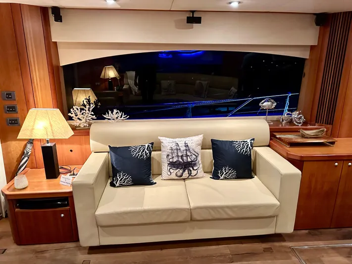 My Sirena Yacht Photos Pics Luxurious interior of 2008 Sunseeker Manhattan 70 yacht with elegant sofa and nautical decor.
