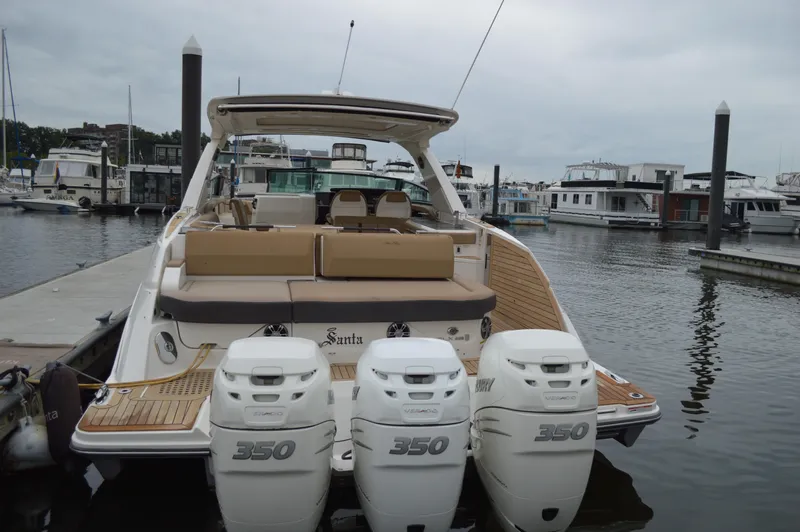 La Santa Yacht Photos Pics 2019 Sea Ray SLX 400 Outboard docked, featuring triple 350 horsepower engines.