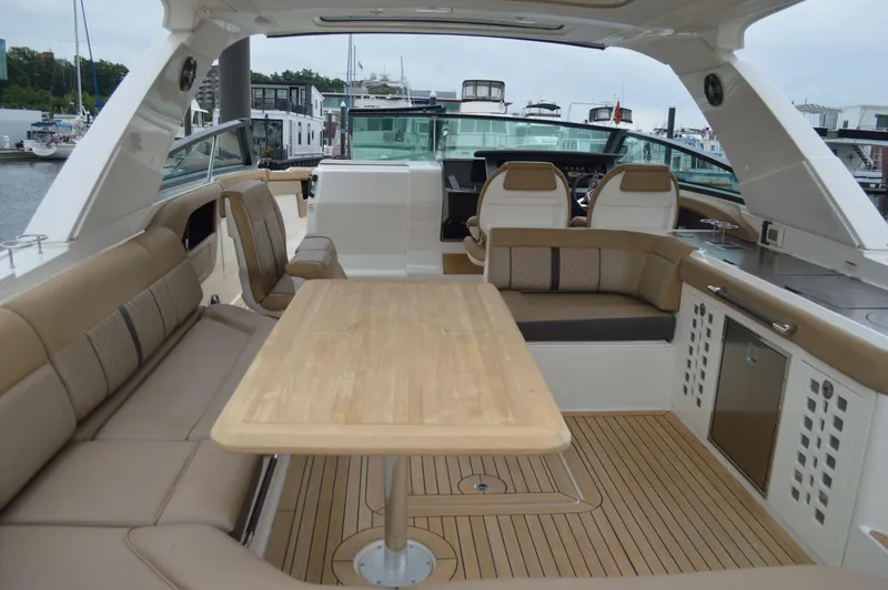 La Santa Yacht Photos Pics Luxurious 2019 Sea Ray SLX 400 Outboard interior with spacious seating and elegant table.