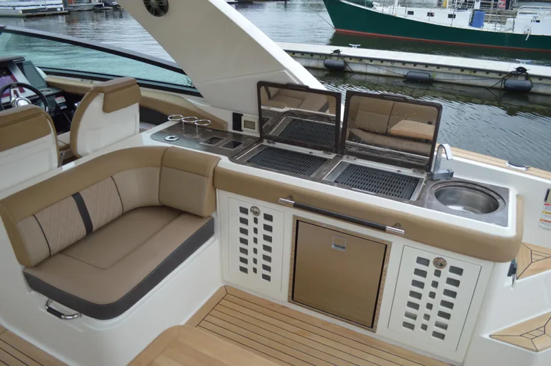 La Santa Yacht Photos Pics 2019 Sea Ray SLX 400 Outboard boat interior with seating and outdoor kitchen area.