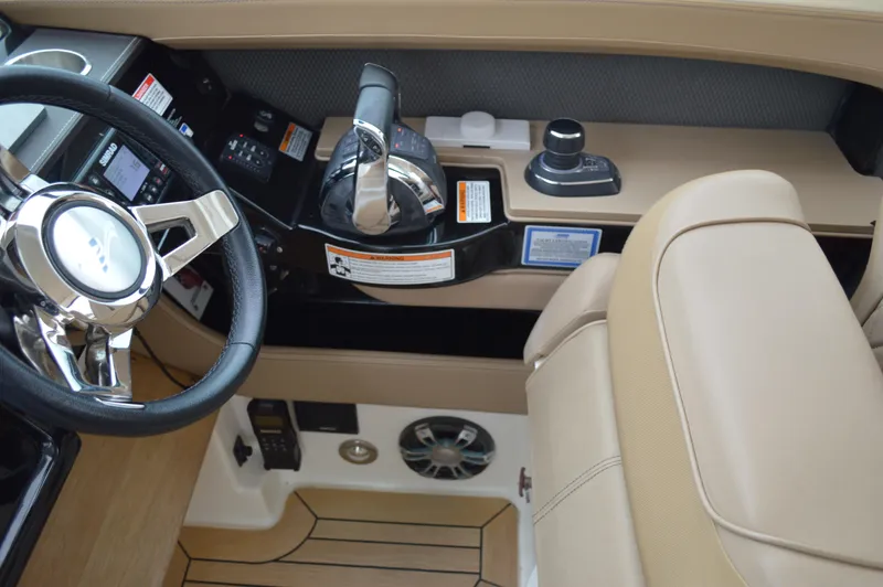 La Santa Yacht Photos Pics 2019 Sea Ray SLX 400 Outboard helm with steering wheel and controls.