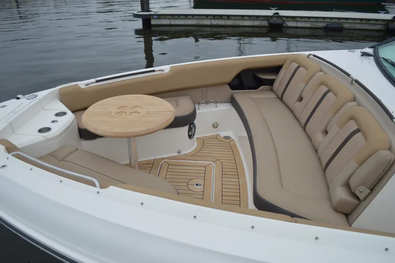 La Santa Yacht Photos Pics Luxurious seating area on 2019 Sea Ray SLX 400 Outboard boat with wooden table.
