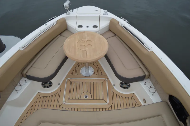 La Santa Yacht Photos Pics 2019 Sea Ray SLX 400 Outboard boat interior with teak flooring and cushioned seating.