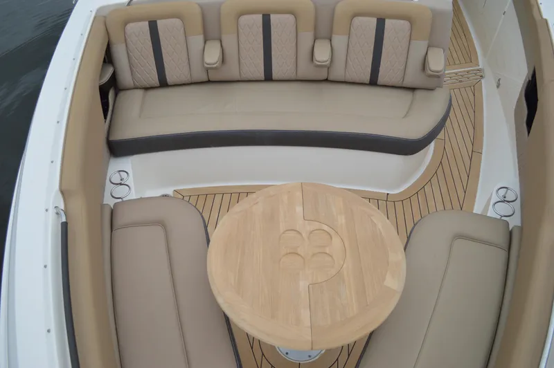 La Santa Yacht Photos Pics Luxurious seating area on 2019 Sea Ray SLX 400 Outboard with teak table and cup holders.