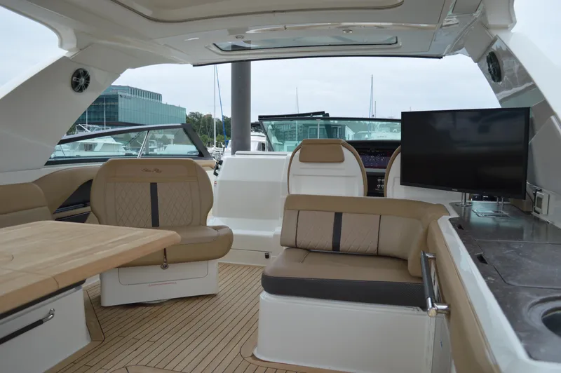 La Santa Yacht Photos Pics Luxurious interior of 2019 Sea Ray SLX 400 Outboard with seating and entertainment system.