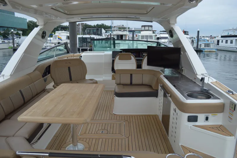 La Santa Yacht Photos Pics Luxurious 2019 Sea Ray SLX 400 Outboard interior with seating, table, and kitchenette.