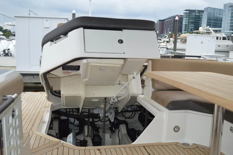 La Santa Yacht Photos Pics 2019 Sea Ray SLX 400 Outboard engine compartment, open for maintenance at a marina.