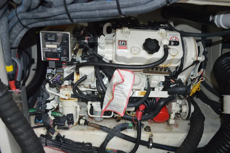 La Santa Yacht Photos Pics Engine compartment of a 2019 Sea Ray SLX 400 Outboard with visible wiring and components.