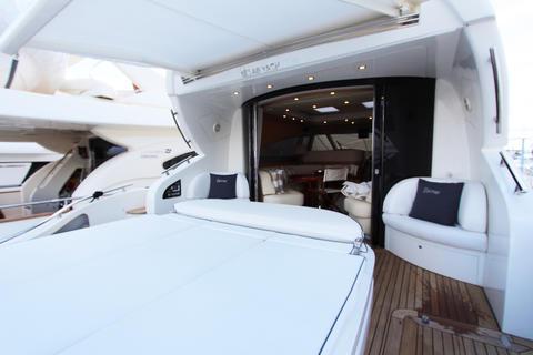 Luxurious AB 68 yacht interior with spacious seating, 2004 model.