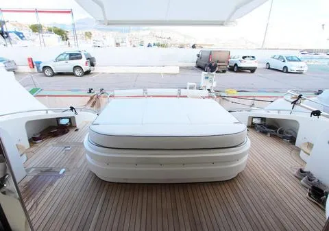 Luxury yacht deck with seating area, AB 68 model, 2004, parked at marina.