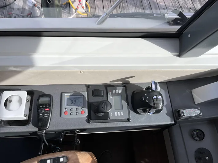 62 Azimut 62s Yacht Photos Pics Control panel of a 2008 Azimut 62S yacht with navigation equipment.