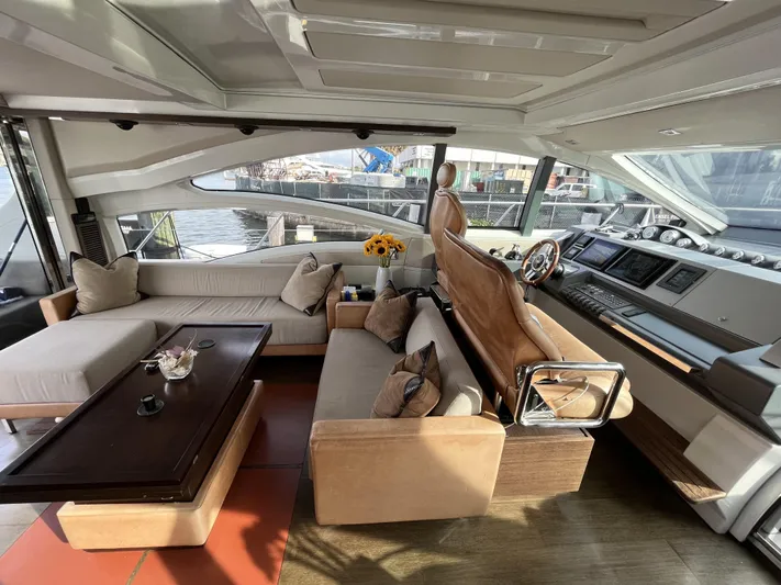 62 Azimut 62s Yacht Photos Pics Luxurious interior of a 2008 Azimut 62S yacht with elegant seating and helm.