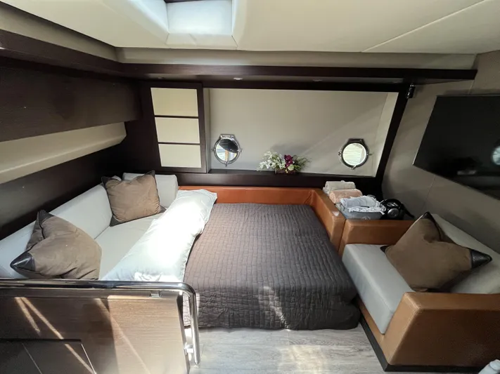 62 Azimut 62s Yacht Photos Pics Luxurious interior of a 2008 Azimut 62S yacht with elegant bedding and modern decor.