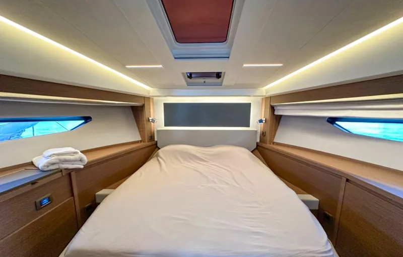  Yacht Photos Pics Luxurious cabin interior of 2024 Prestige 520 Fly yacht with modern design and ambient lighting.
