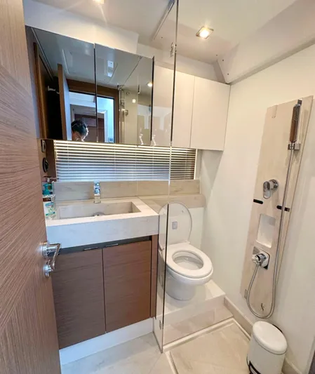  Yacht Photos Pics 2024 Prestige 520 Fly yacht bathroom with modern fixtures and sleek design.