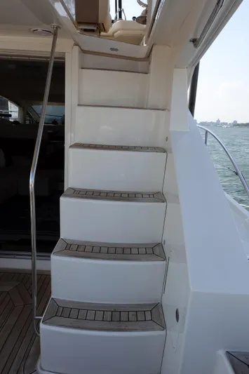  Yacht Photos Pics Staircase on 2012 Sea Ray 450 Sedan Bridge yacht, leading to upper deck.