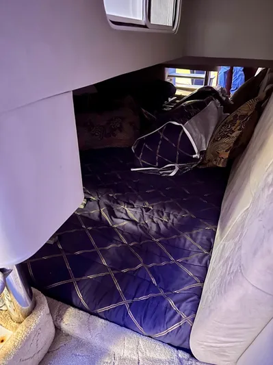  Yacht Photos Pics Interior cabin of a 2004 Formula 370 Super Sport boat with a cozy bed setup.