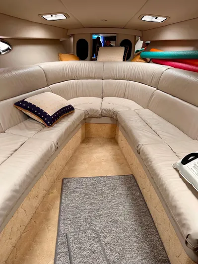  Yacht Photos Pics Luxurious interior of a 2004 Formula 370 Super Sport boat with beige seating.