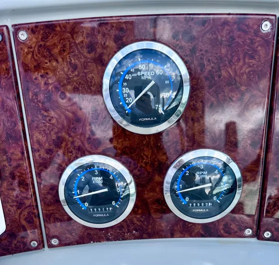  Yacht Photos Pics Dashboard gauges of a 2004 Formula 370 Super Sport boat.