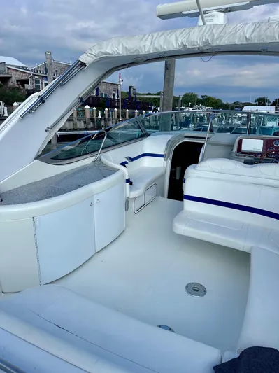  Yacht Photos Pics 2004 Formula 370 Super Sport boat interior with white seating and open deck.