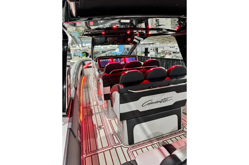  Yacht Photos Pics 2024 Cigarette 41' Nighthawk SD Edition interior with sleek seating and illuminated dashboard.