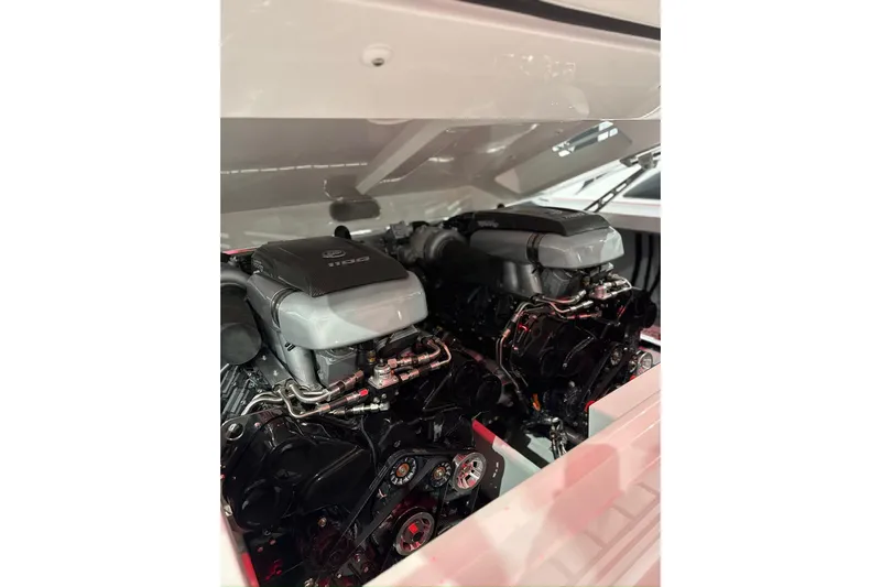  Yacht Photos Pics 2024 Cigarette 41' Nighthawk SD Edition engine compartment showcasing powerful dual engines.