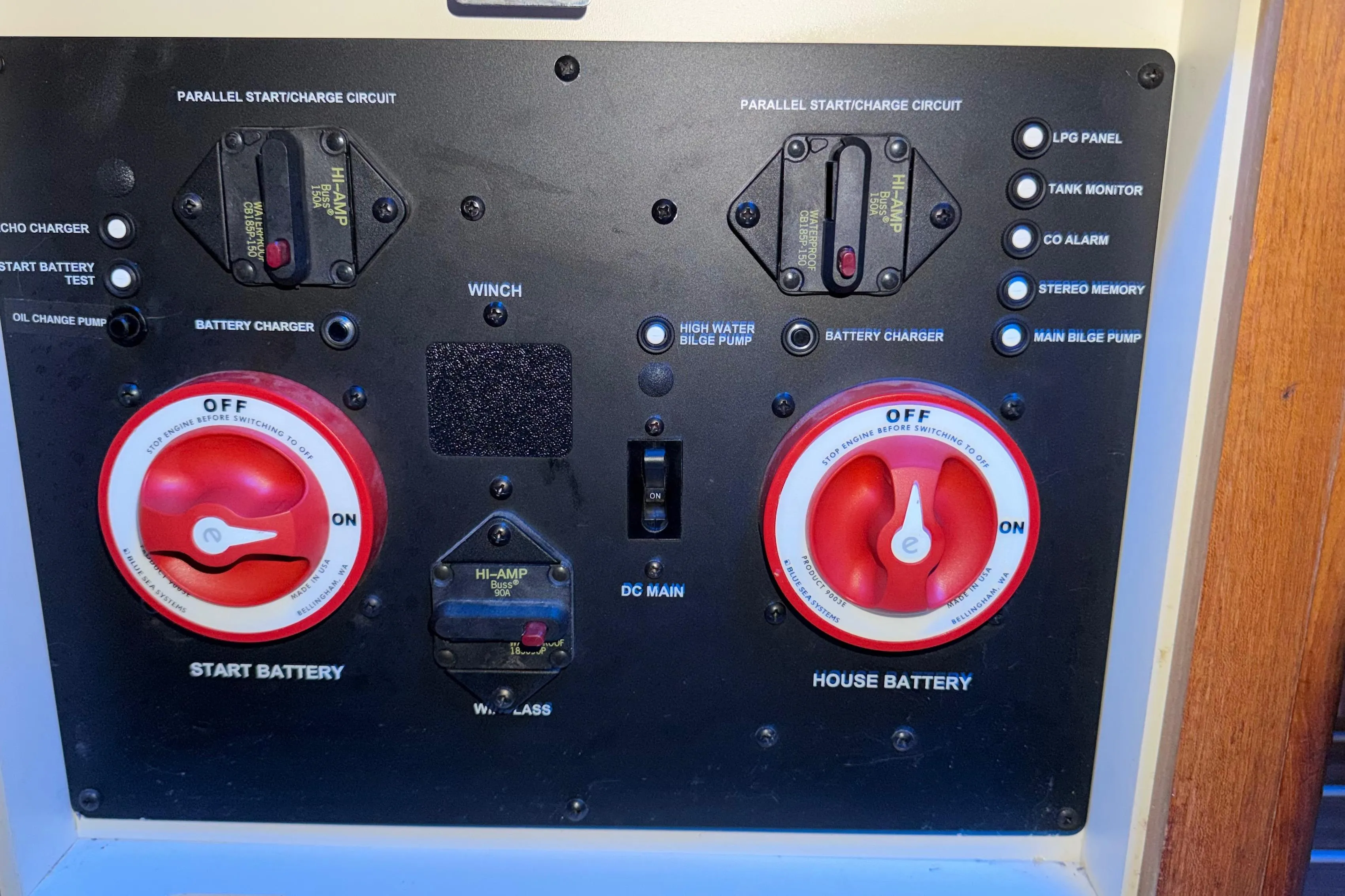 Control panel of a 2005 Hunter 38 boat with battery switches and indicators.