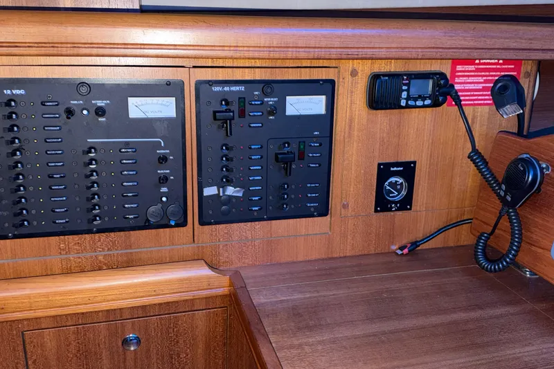 Nauti Cat Yacht Photos Pics Control panel of a 2005 Hunter 38 sailboat with communication equipment.