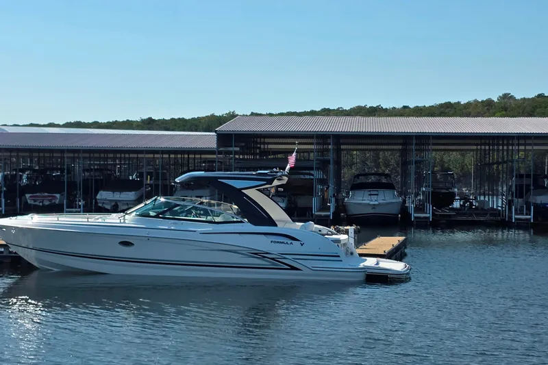  Yacht Photos Pics 2026 Formula 350 Crossover Bowrider I/O docked at marina, sunny day.