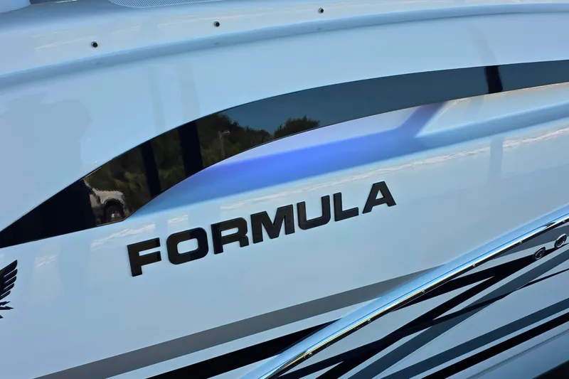  Yacht Photos Pics 2026 Formula 350 Crossover Bowrider I/O boat with sleek design and branding.