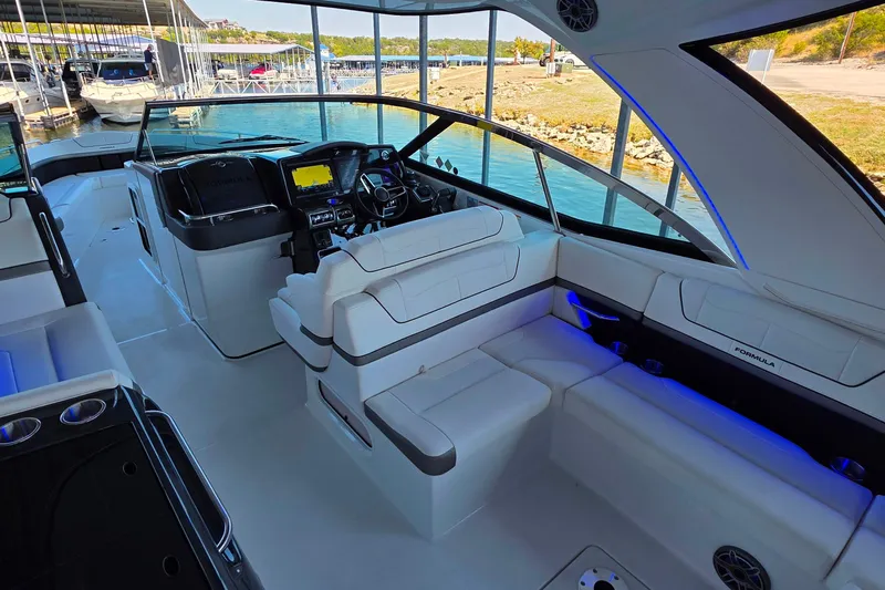  Yacht Photos Pics 2026 Formula 350 Crossover Bowrider I/O interior with modern seating and navigation system.