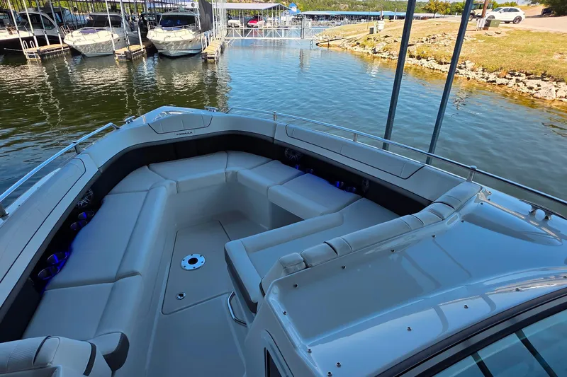  Yacht Photos Pics 2026 Formula 350 Crossover Bowrider I/O with spacious seating at a marina.