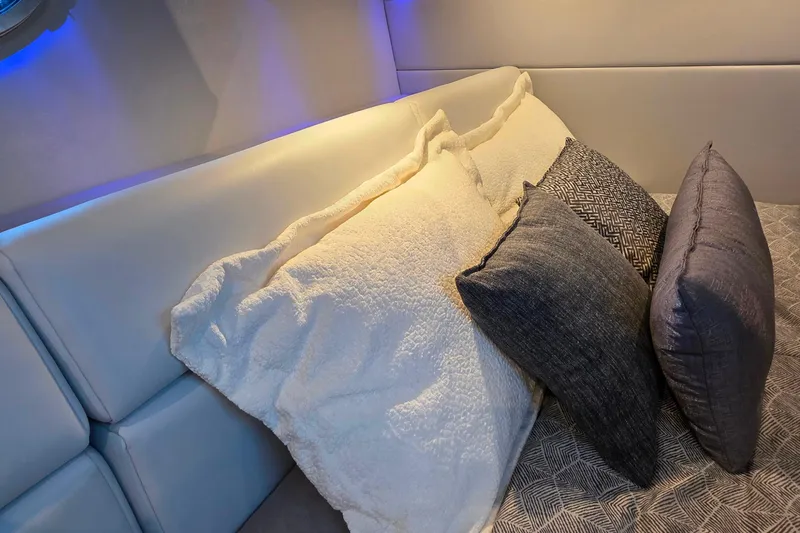  Yacht Photos Pics Luxurious interior of 2026 Formula 350 Crossover Bowrider I/O with plush pillows and ambient lighting.