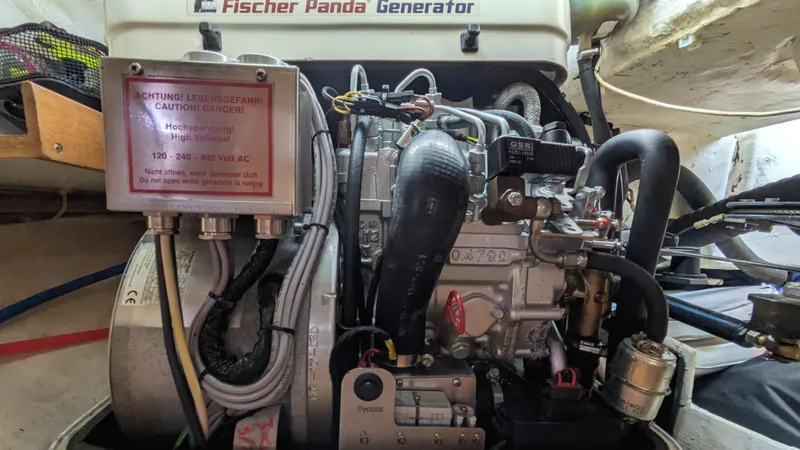  Yacht Photos Pics Fischer Panda generator in a 2004 Catalina 42 MkII sailboat engine compartment.