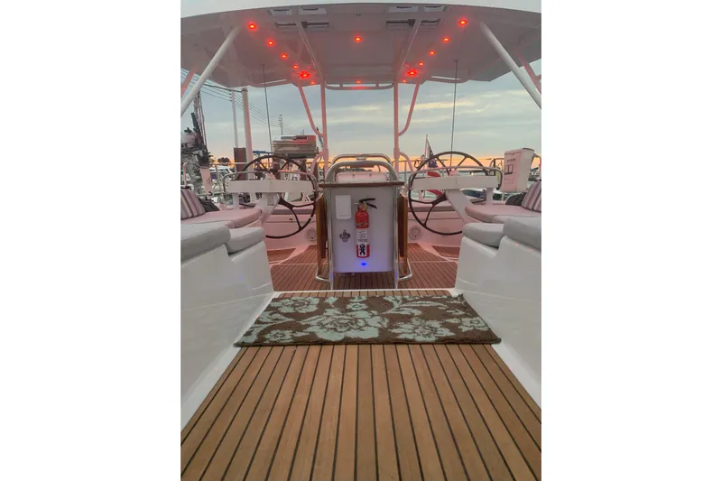 Remedy Yacht Photos Pics Luxurious 2012 Jeanneau 57 yacht interior with elegant seating and ambient lighting.