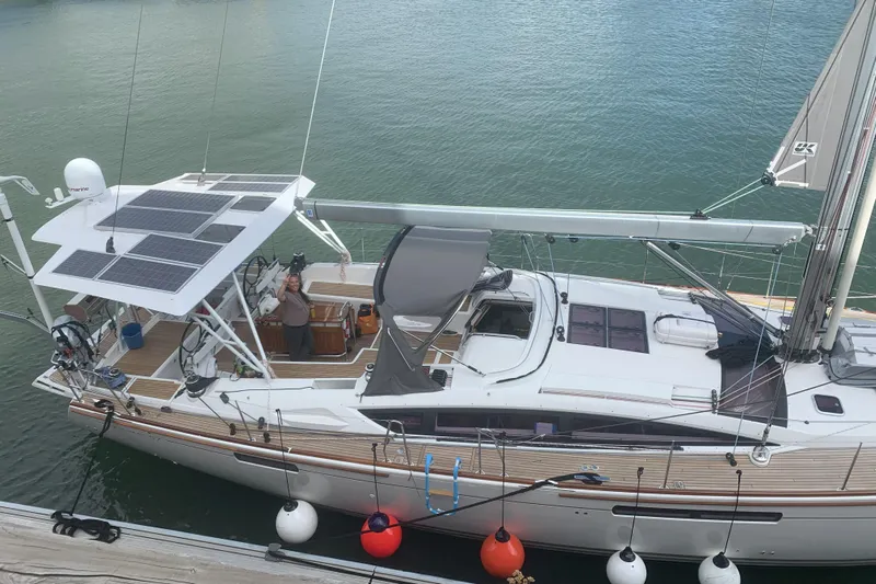 Remedy Yacht Photos Pics 2012 Jeanneau 57 yacht with solar panels docked at marina.
