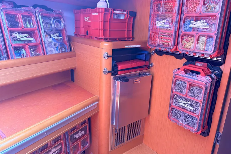 Remedy Yacht Photos Pics Organized storage area on a 2012 Jeanneau 57 yacht with Milwaukee toolboxes.