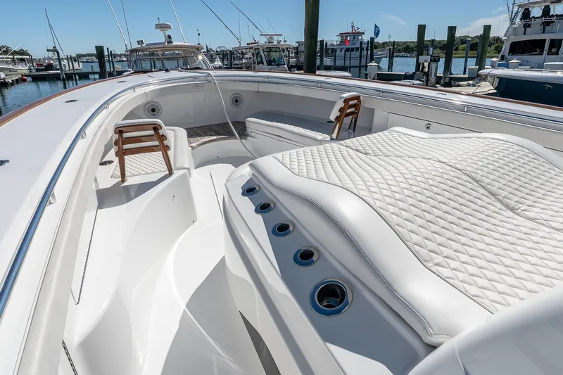  Yacht Photos Pics 2023 Valhalla Boatworks V-46 luxury boat interior with quilted seating and sleek design.