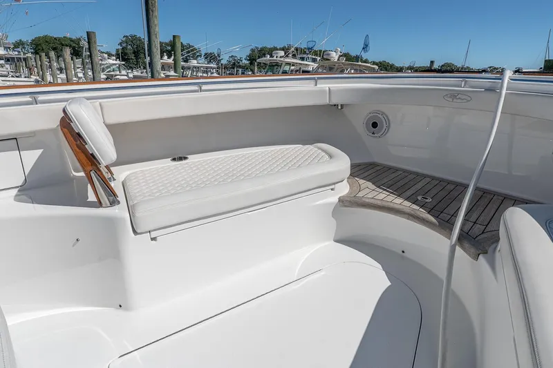  Yacht Photos Pics 2023 Valhalla Boatworks V-46 interior with white seating and teak flooring.