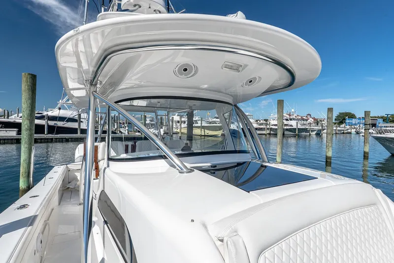  Yacht Photos Pics 2023 Valhalla Boatworks V-46 at marina, showcasing sleek design and modern features.