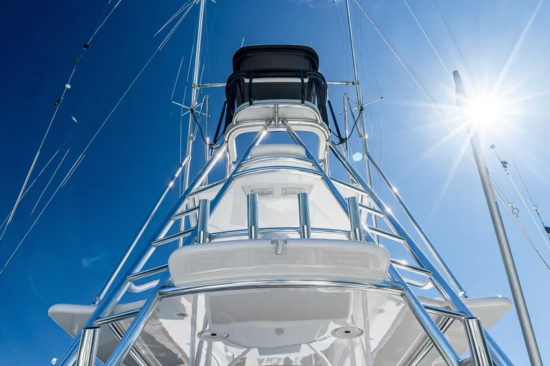 Yacht Photos Pics 2023 Valhalla Boatworks V-46 yacht tower against a bright blue sky.