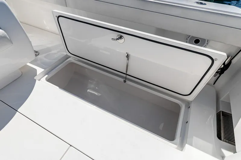  Yacht Photos Pics Open storage compartment on 2023 Valhalla Boatworks V-46 deck.