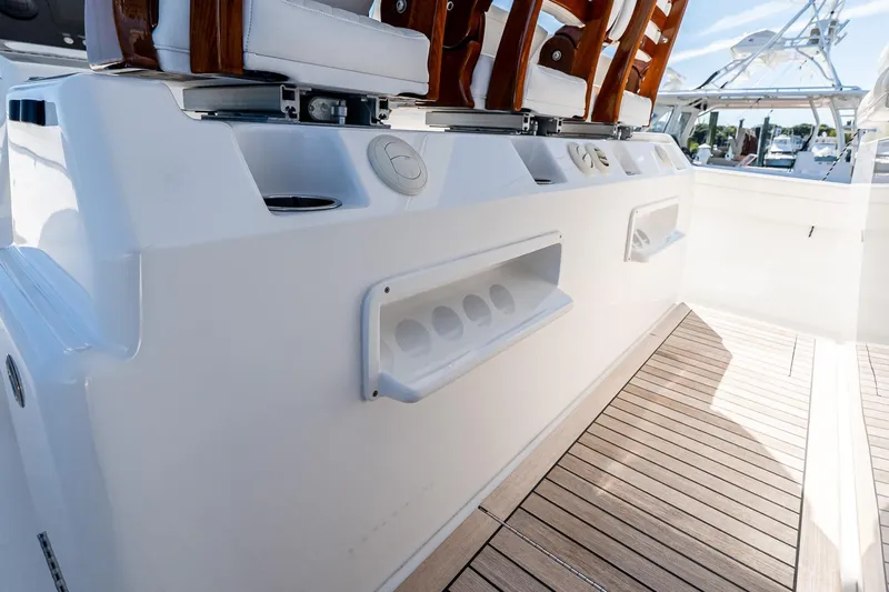  Yacht Photos Pics 2023 Valhalla Boatworks V-46 deck with seating and storage compartments.