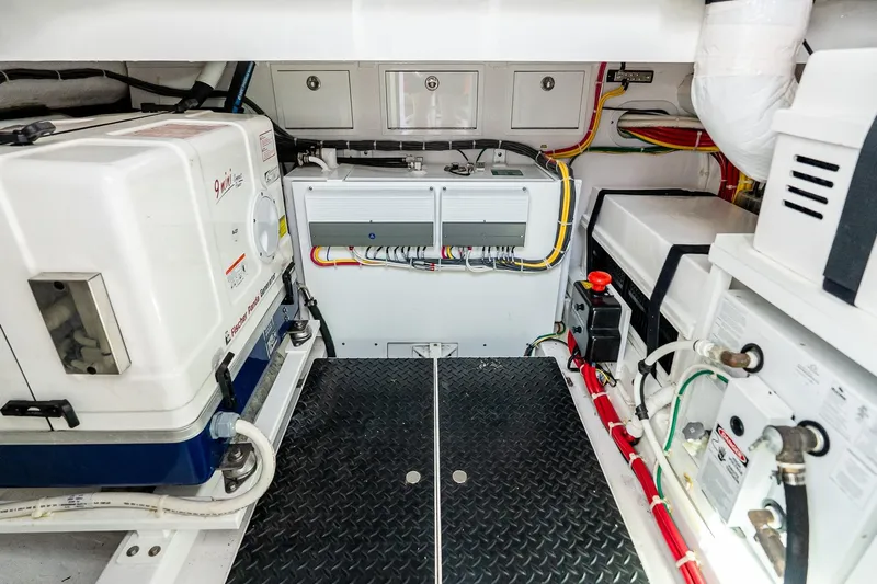  Yacht Photos Pics Engine room of 2023 Valhalla Boatworks V-46, showcasing equipment and wiring.