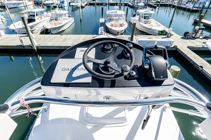  Yacht Photos Pics 2023 Valhalla Boatworks V-46 helm with Garmin navigation, docked at marina.