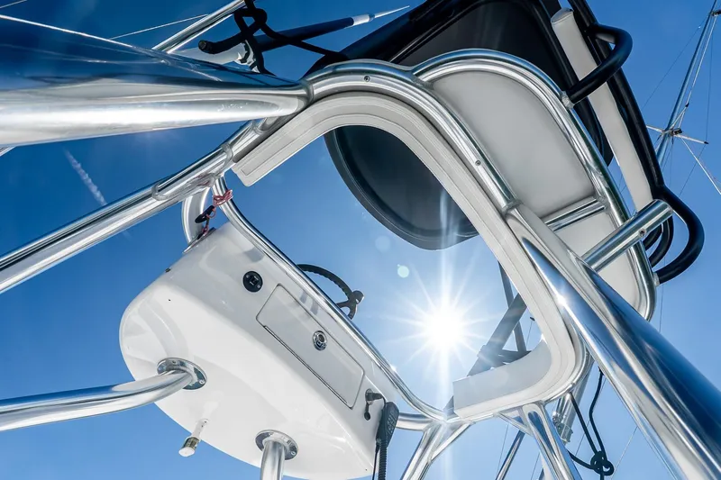  Yacht Photos Pics 2023 Valhalla Boatworks V-46, sleek design, sunlit view from below, clear blue sky.