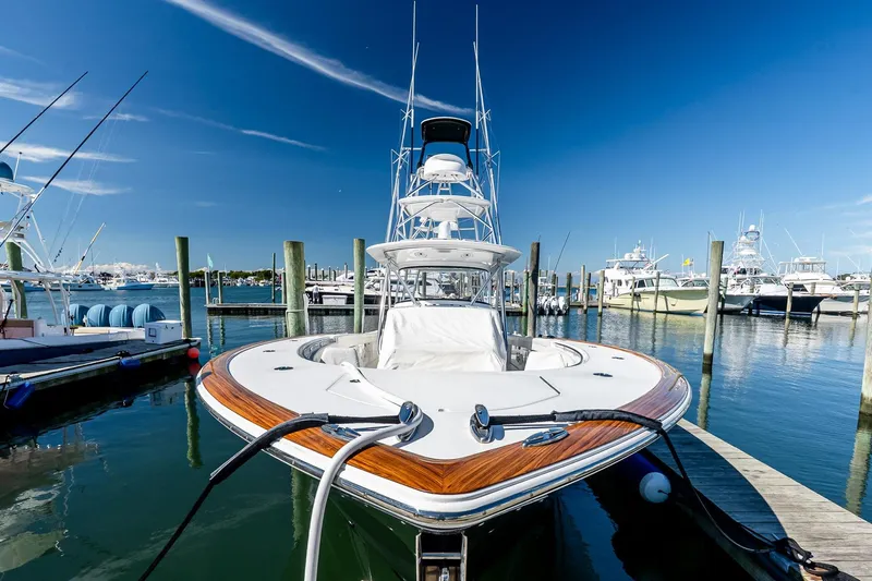  Yacht Photos Pics 2023 Valhalla Boatworks V-46 docked at marina under clear blue sky.