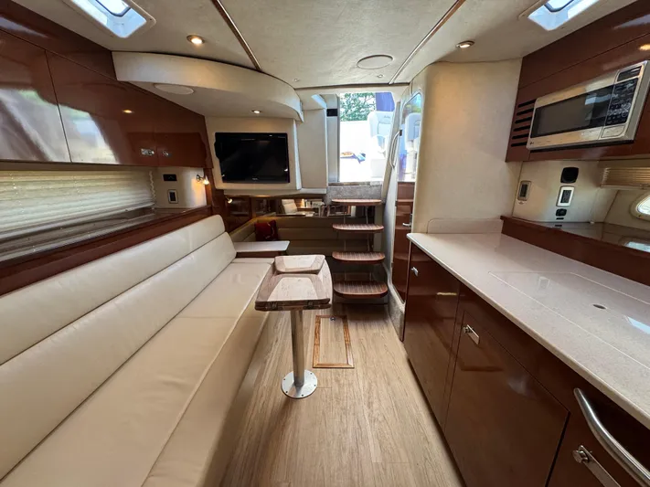  Yacht Photos Pics Luxurious interior of 2010 Sea Ray 370 Sundancer yacht with modern amenities.