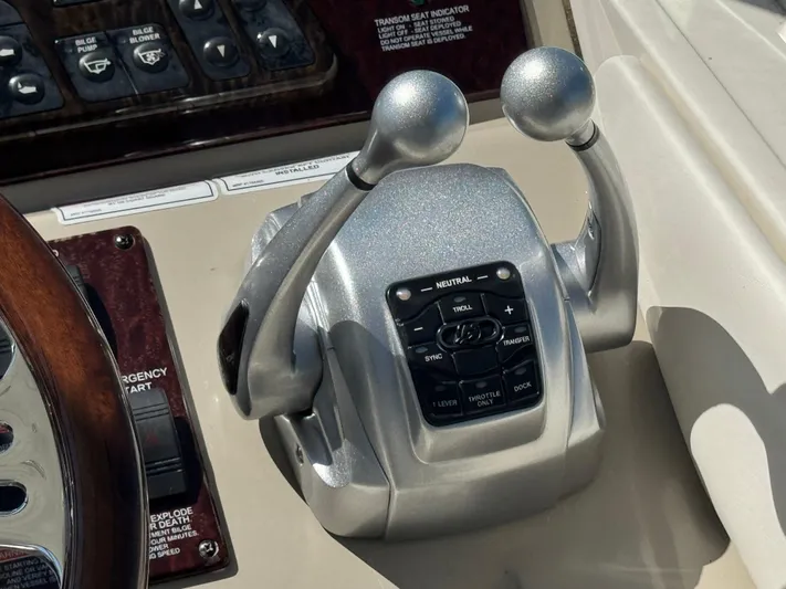  Yacht Photos Pics Throttle controls on a 2010 Sea Ray 370 Sundancer boat dashboard.